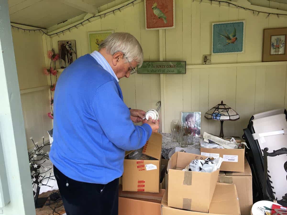 Christopher Garrett Ebay Entrepreneur Wirral - sorting through his colections in the shed Ukandoo Academy ebay Making Money from Ebay - Even in Retirement Christopher Garrett Ebay Entrepreneur Wirral sorting through his colections in the shed Ukandoo Academy